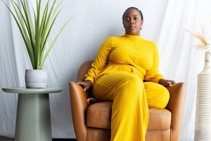 May be an image of one or more people, makeup, dress, turtleneck, jumpsuit and text