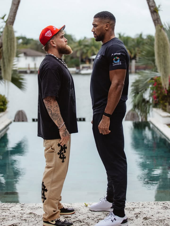 May be an image of one or more people, beard, people standing, sportswear and text