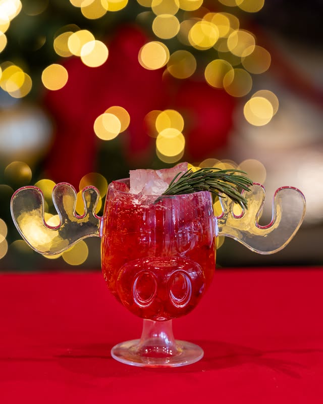 May be an image of cocktail and text