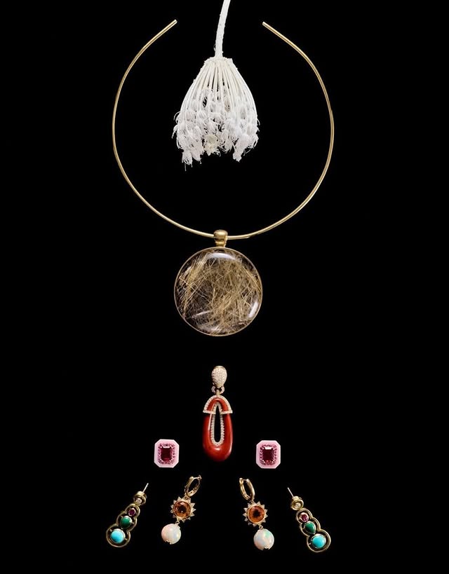 May be an image of lace, necklace and text