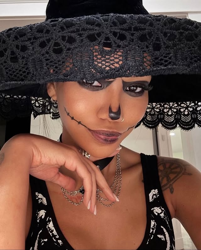 May be an image of one or more people, makeup, scarecrow, skull and costume