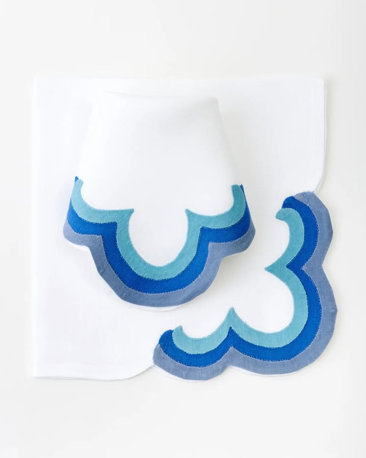 May be an image of napkin ring, tablecloth, napkin, placemat and text