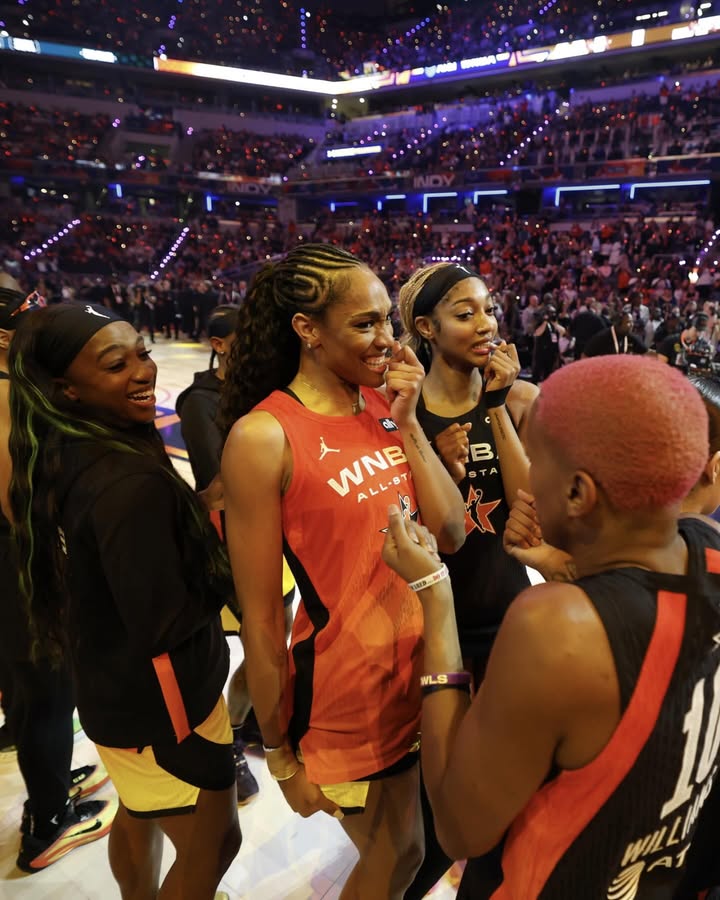 May be an image of basketball, basketball jersey and text