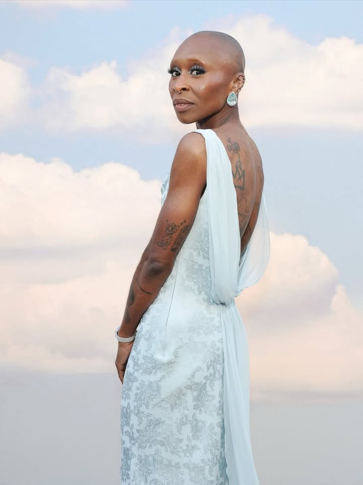 May be an image of one or more people, makeup, gown and dress