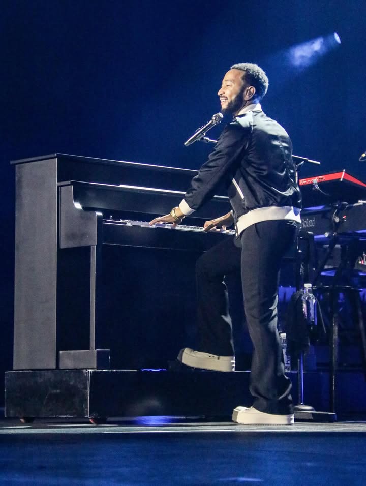 May be an image of piano, microphone, concert and text