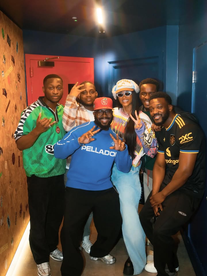 May be an image of one or more people, people standing and text