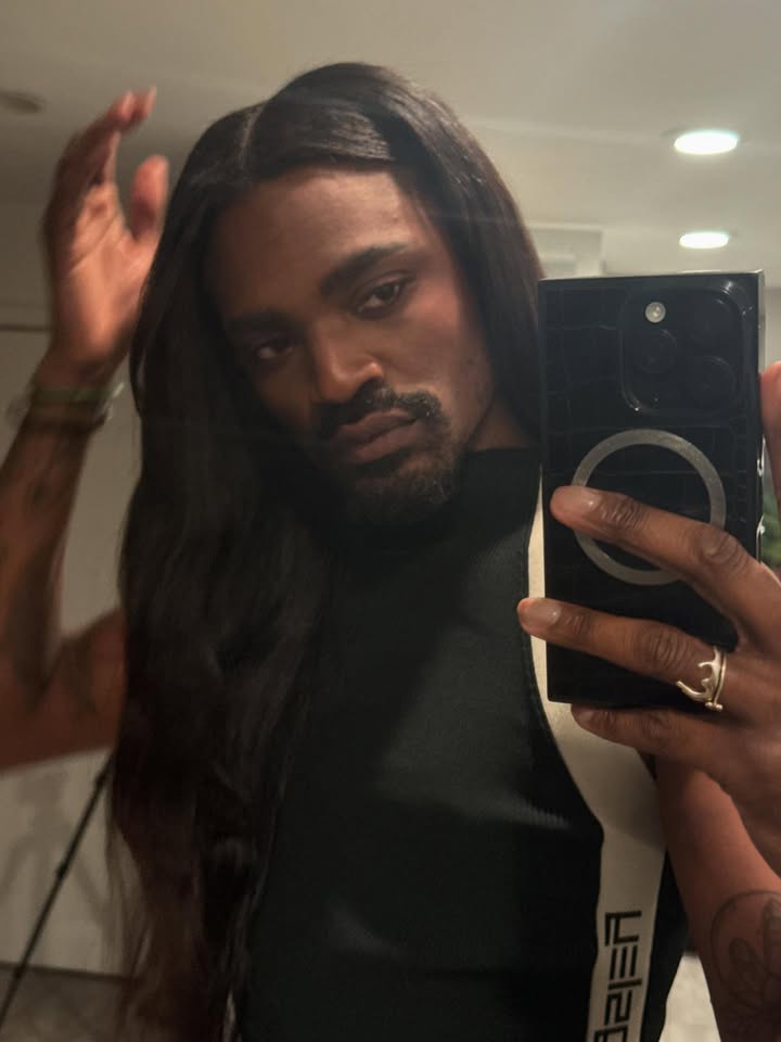 May be a selfie of one or more people, beard, long hair, turtleneck and text