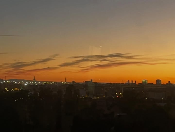 May be an image of cloud, horizon, twilight and text