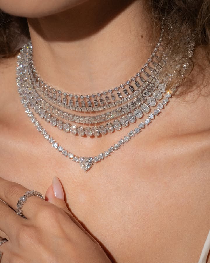 May be an image of jewelry, choker and text