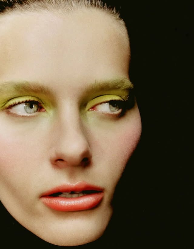 May be a closeup of one or more people, hair, makeup and text