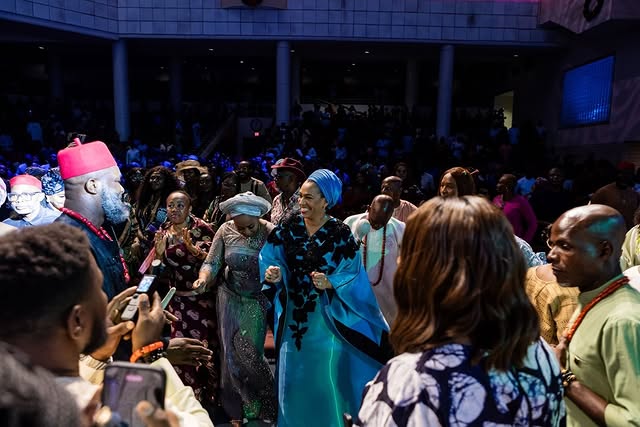 May be an image of one or more people, crowd and text