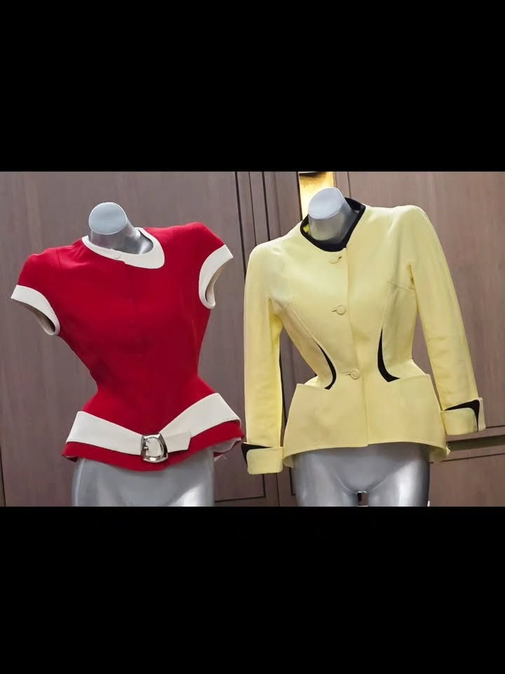 May be an image of mannequin, overskirt, top, dress, blazer and text