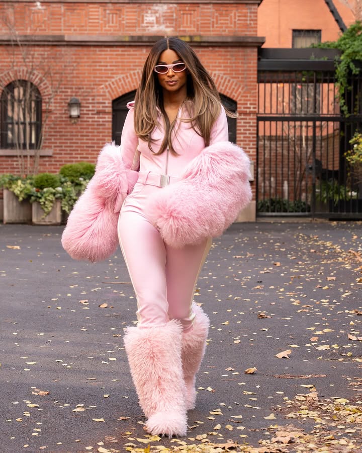 May be an image of one or more people, makeup, fur coat, parka and text