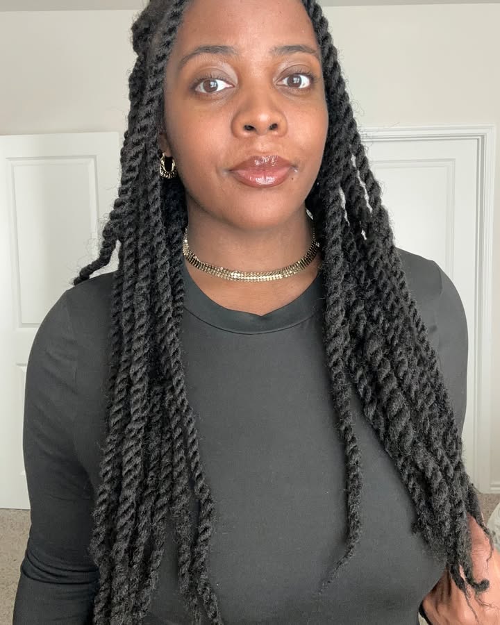 May be an image of one or more people, braids and text