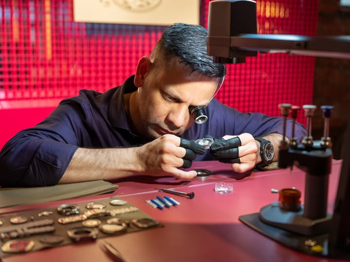 May be an image of wrist watch and text