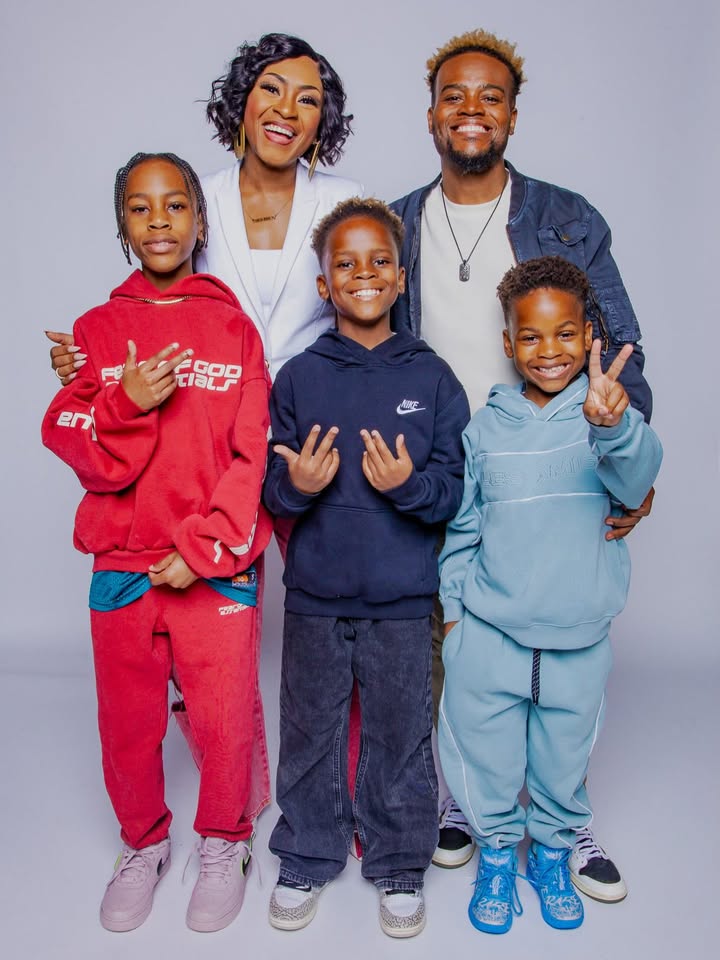 May be an image of baby, smiling, sweatsuit and text