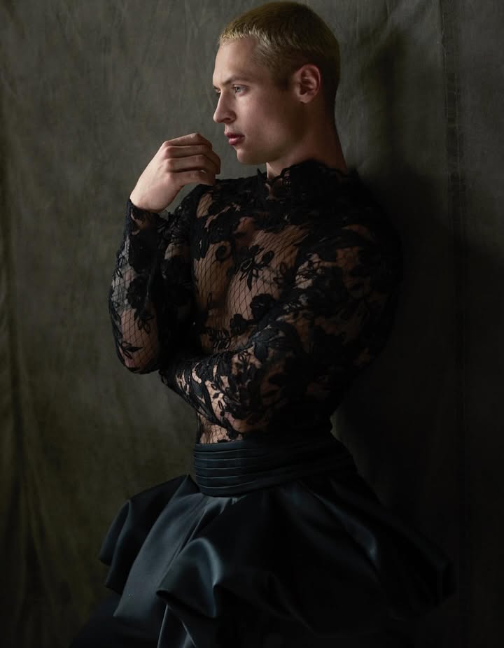May be an image of one or more people, makeup, kilt, gown and text
