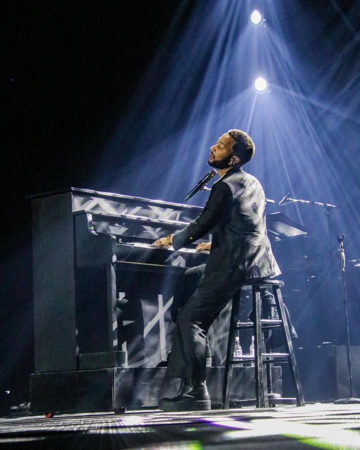 May be an image of piano, microphone, concert and text