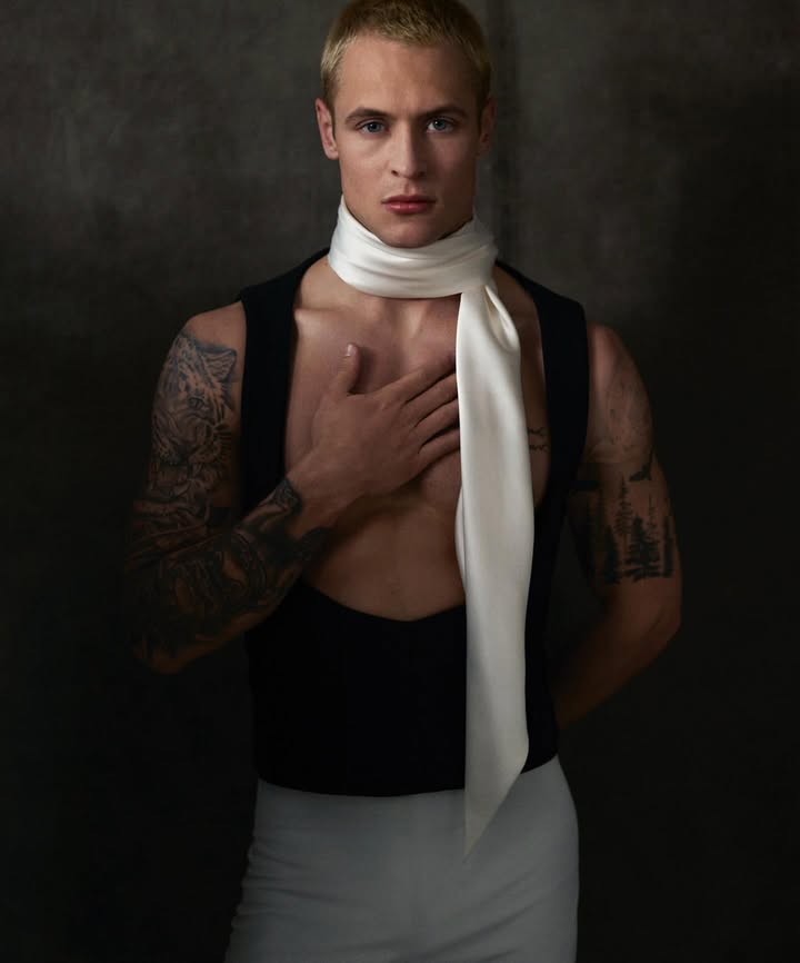 May be an image of one or more people, makeup, neckwear, turtleneck and text