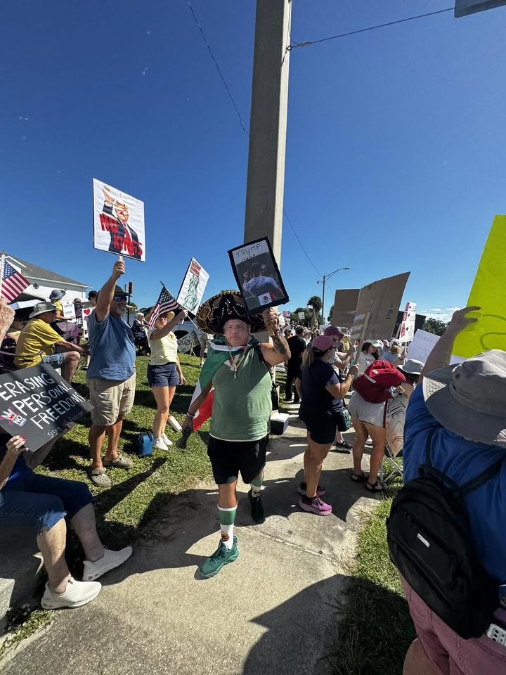 May be an image of standing and flag