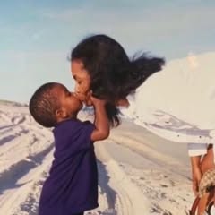 May be an image of baby, makeup, people kissing and text