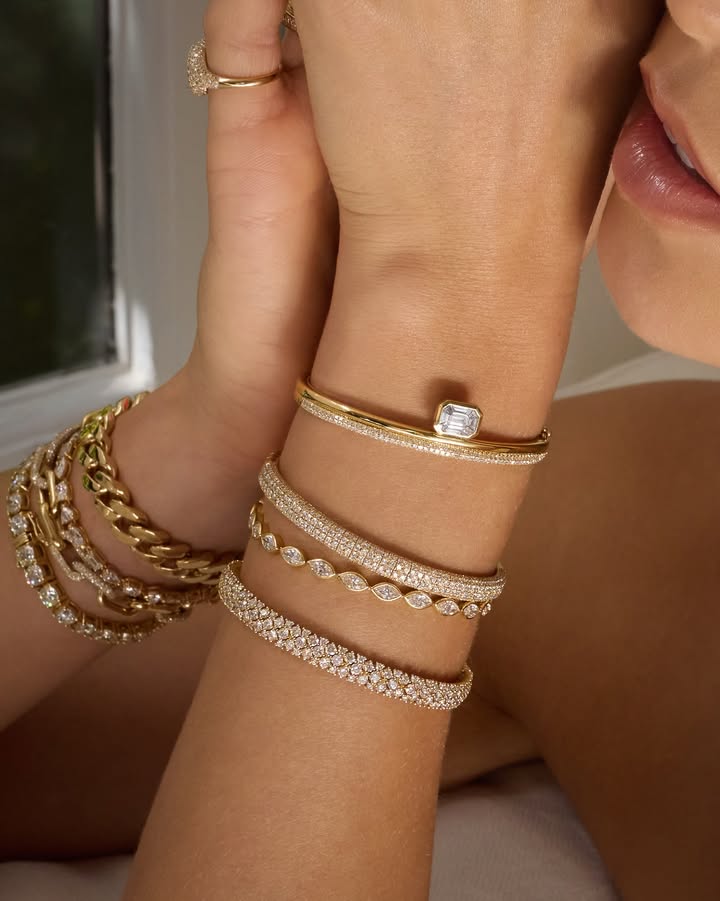 May be an image of jewelry, bangle and text