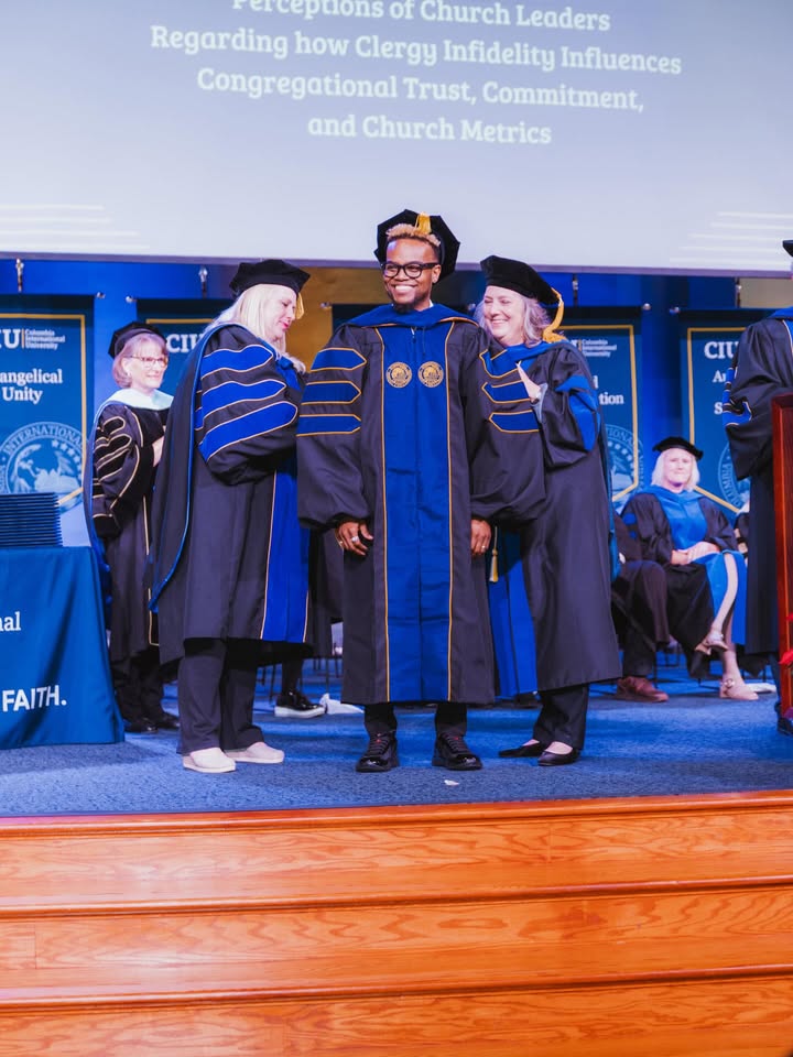 May be an image of ‎standing, microphone and ‎text that says '‎ε of Church Leaders Regarding how Clergy Infidelity Influences Congregational Trust, Commitment, and Church Metrics ប្ជាត ရုပြုး CIV angelical Unity NALON CIT _ه tion LO1 al FAITH.‎'‎‎