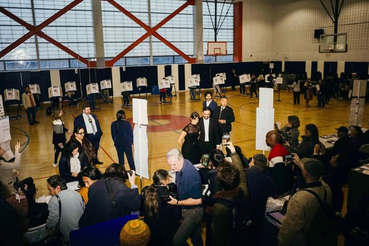 May be an image of volleyball, standing, crowd and text