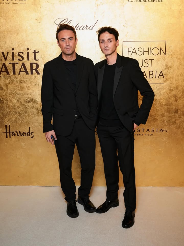 May be an image of dinner jacket and text