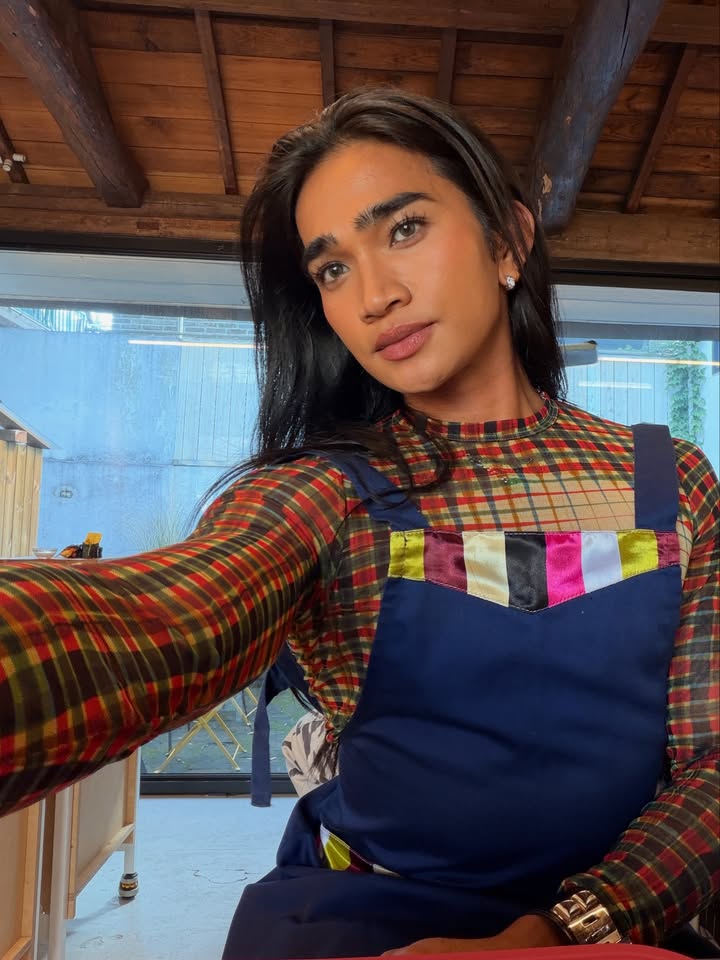 May be a selfie of apron, top and turtleneck