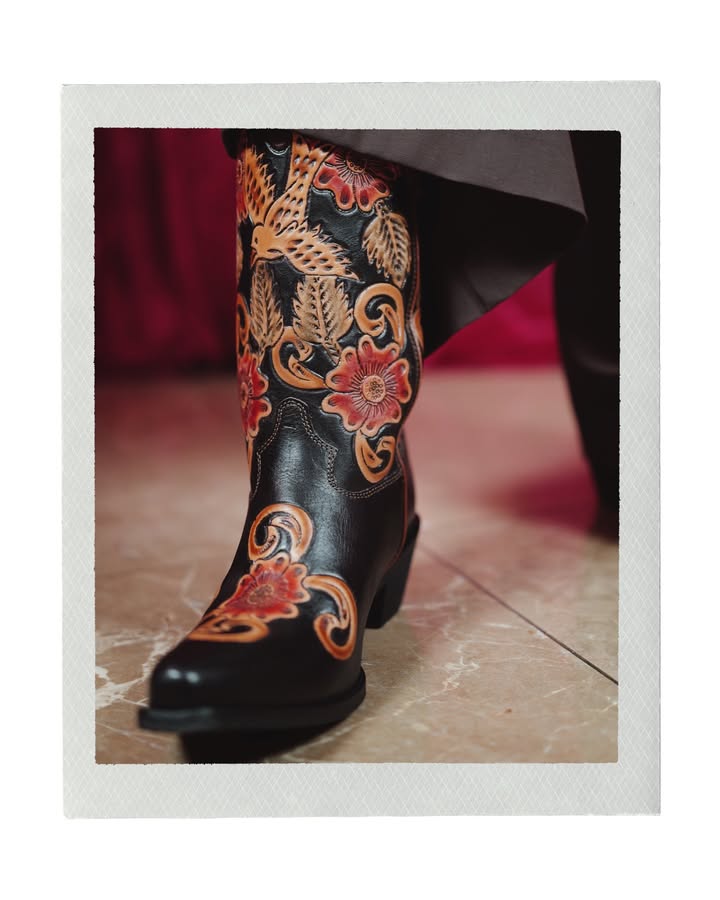 May be an image of boots and text