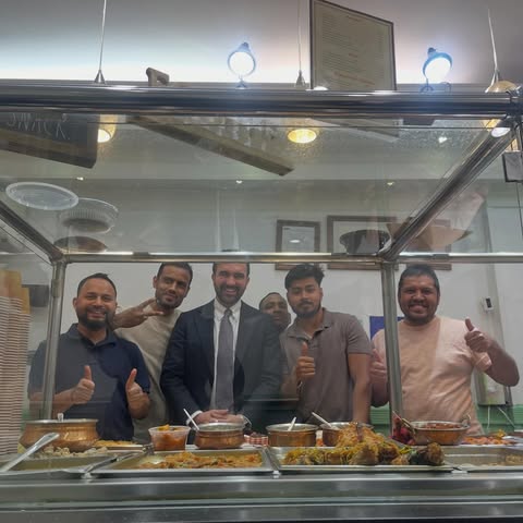 May be an image of one or more people and text