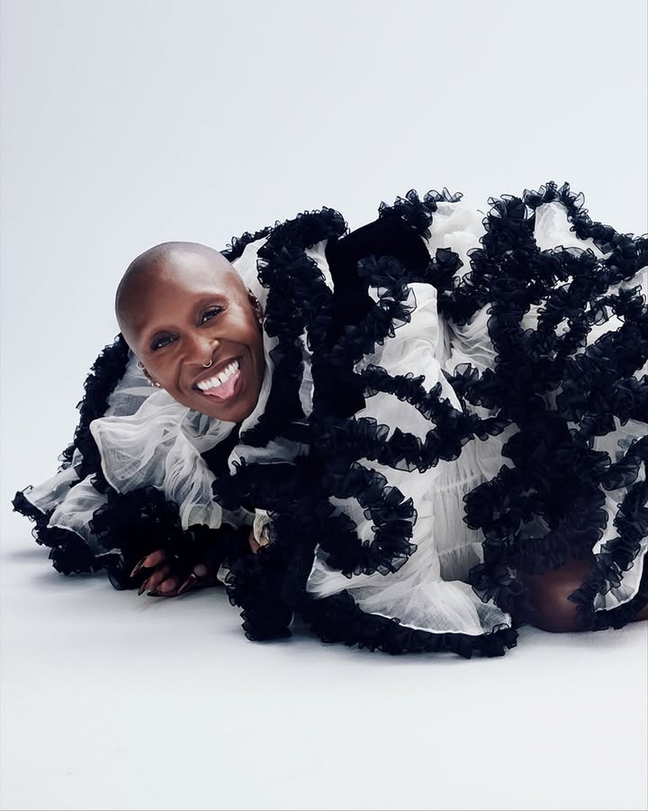 May be an image of one or more people, makeup, costume and headdress