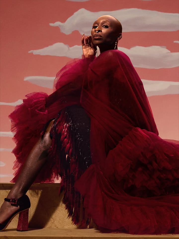 May be an image of one or more people, makeup, headdress, dress and gown