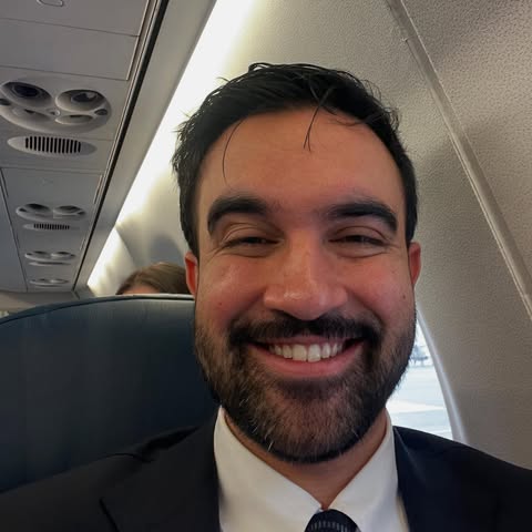 May be a selfie of one or more people, beard, airplane and text