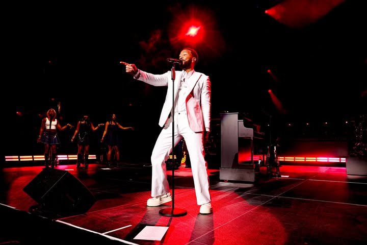 May be an image of microphone, concert and text