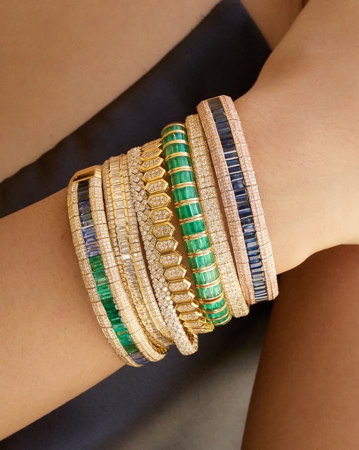 May be an image of jewelry, bangle and text