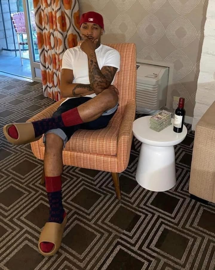 May be an image of wingtip shoes, sock and text