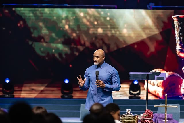 May be an image of saxophone and text