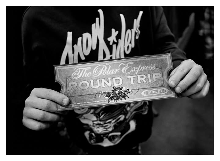 May be a black-and-white image of text that says '4n0/o Ακοη The Polar Express. ROUND TRIP ፍሰያስ Pep M c N0001225'