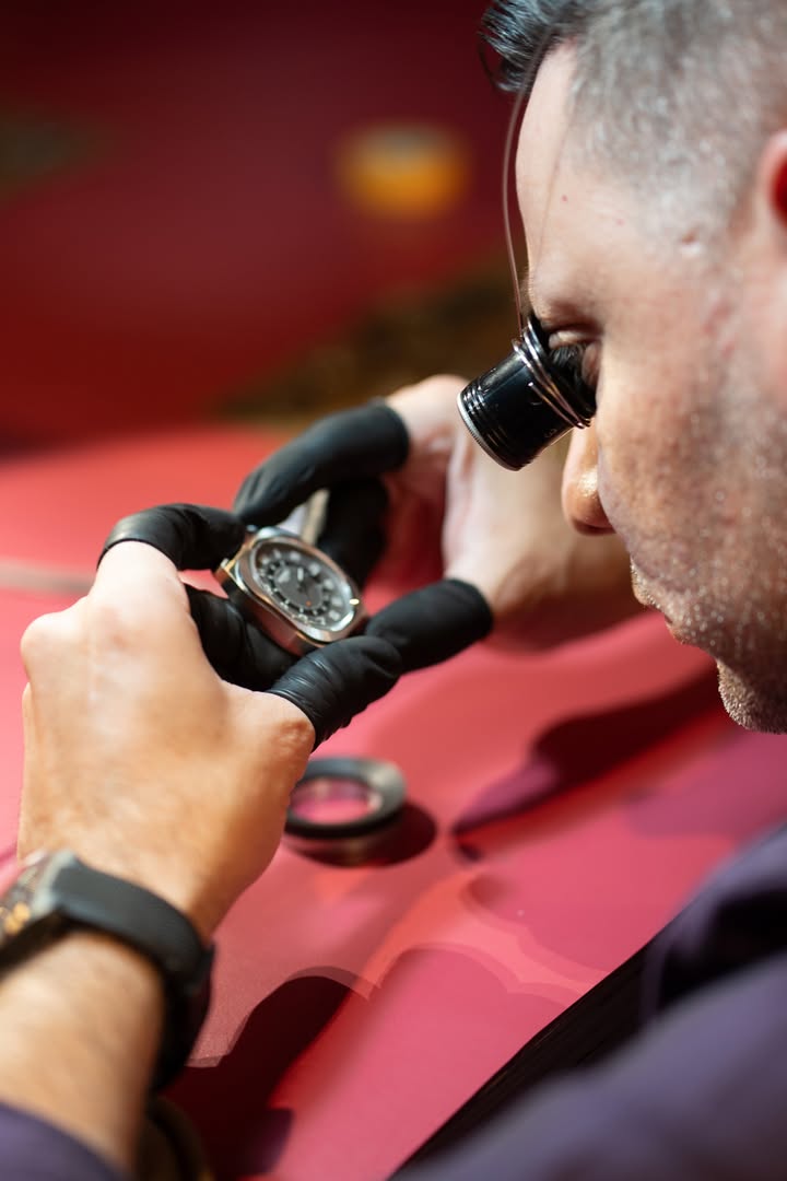 May be an image of wrist watch, microscope, pocketwatch and text