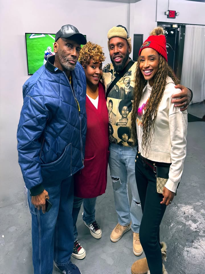 May be an image of one or more people, people standing, turtleneck, beret, headscarf and text