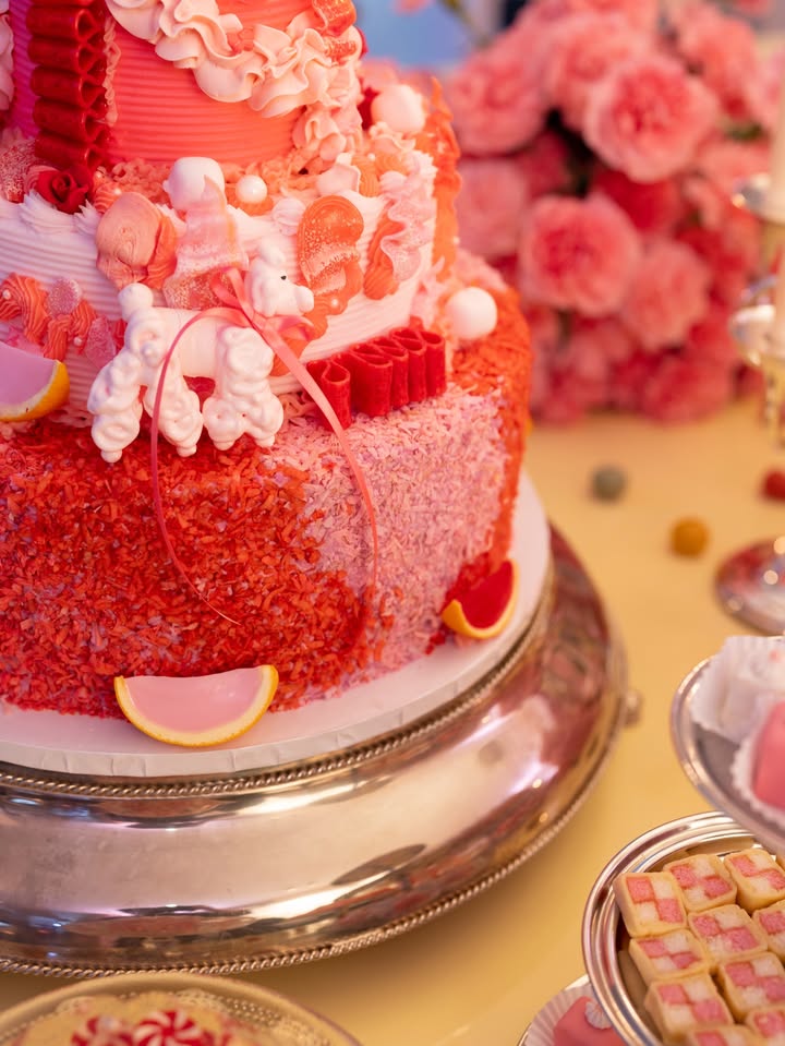 May be an image of wedding cake, fruitcake and text