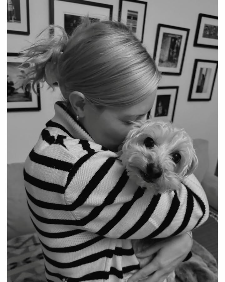 May be a black-and-white image of people kissing, Maltese and Norwich terrier