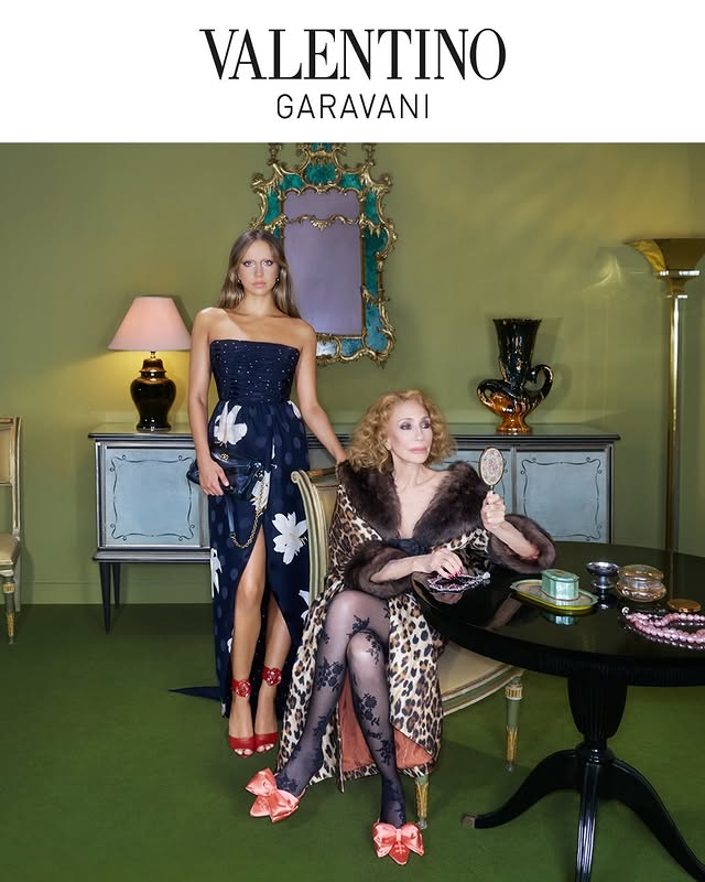 May be an image of magazine, gown and text