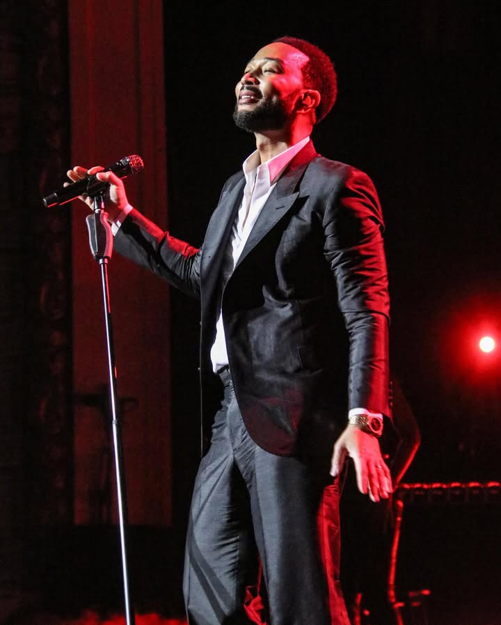 May be an image of microphone, concert and text