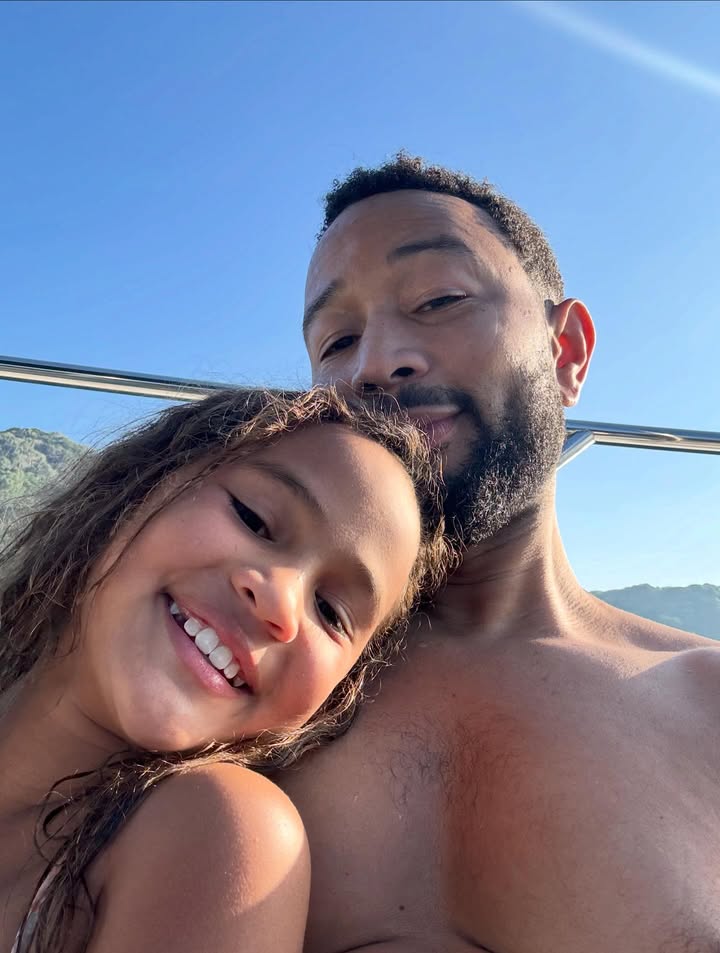 May be an image of baby, boat, houseboat and text