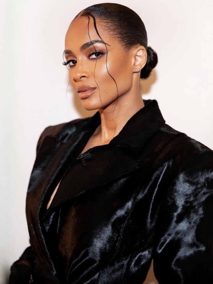 May be an image of one or more people, makeup, leather and text