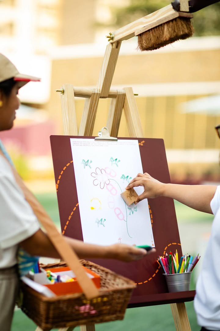May be an image of clipboard, chalk drawing, marker and text