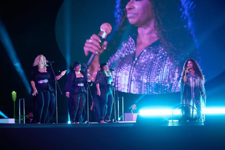 May be an image of microphone, concert and text